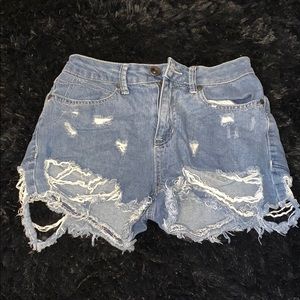 Ripped and Distressed Denim Shorts